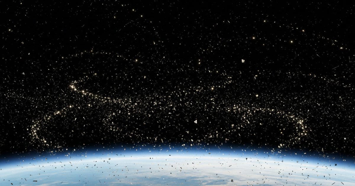 Visualization of thousands of tracked debris objects in low Earth orbit above the curved limb of Earth